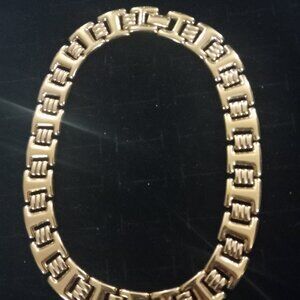 Gold toned monet necklace.